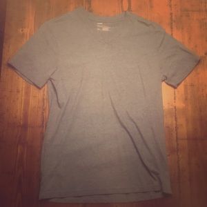 Small, teal short sleeve v-neck tee
